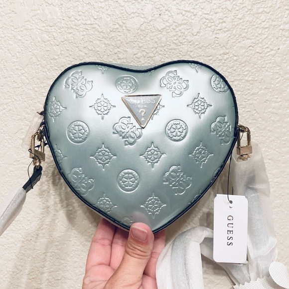 Gorgeous  Guess Arnela Debossed Logo Mini Heart icy blue zip up crossbody bag - Picture 1 of 10